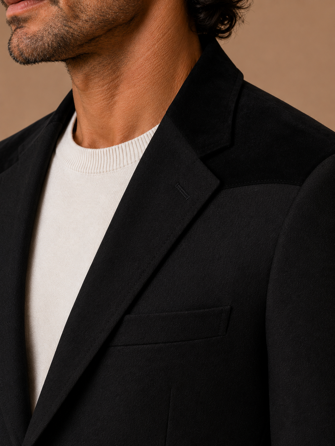 Black modern fit men's blazer by Vellor Vault, front view.