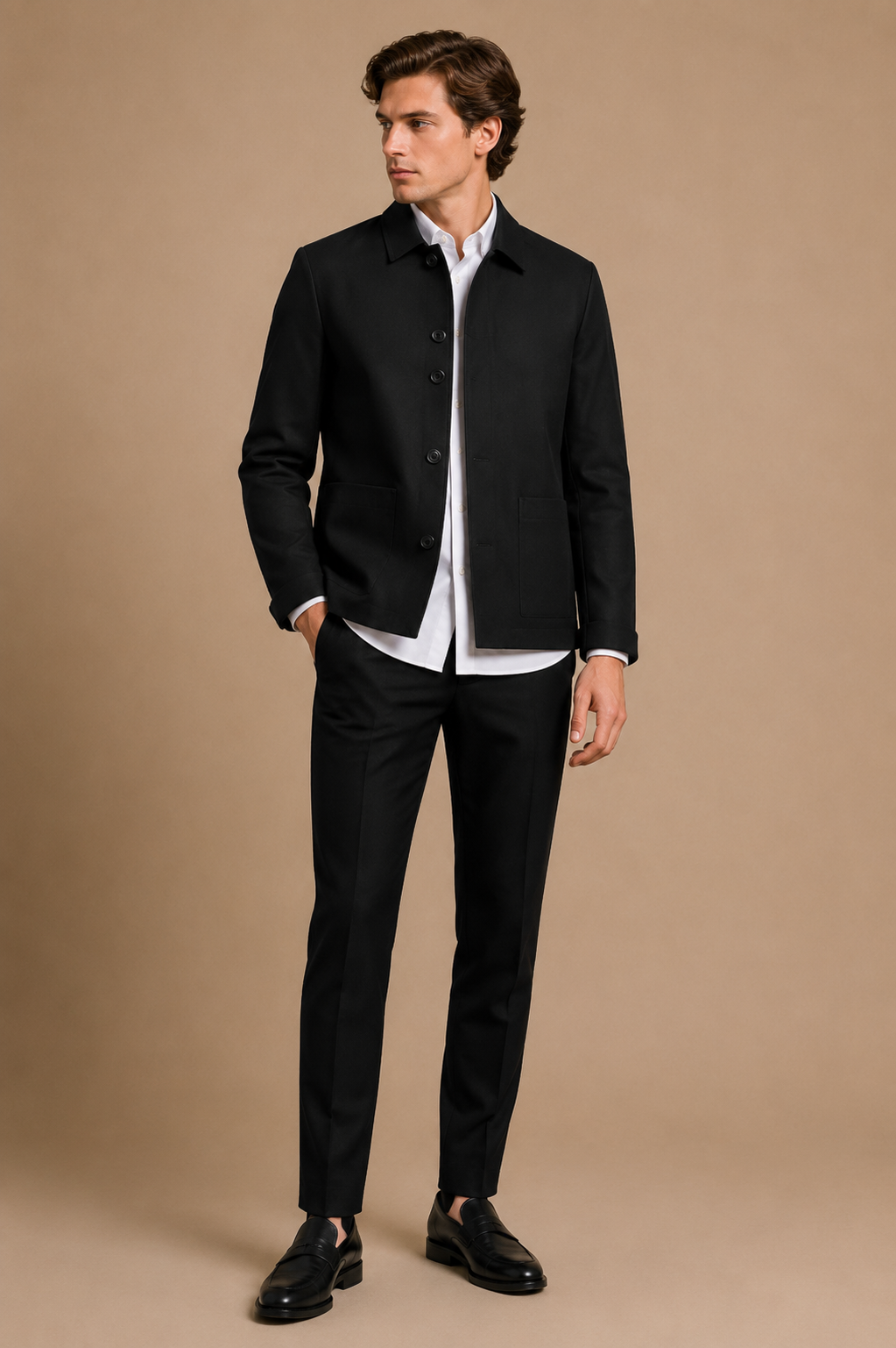 Black modern fit men's uniform by Vellor Vault, angle view.