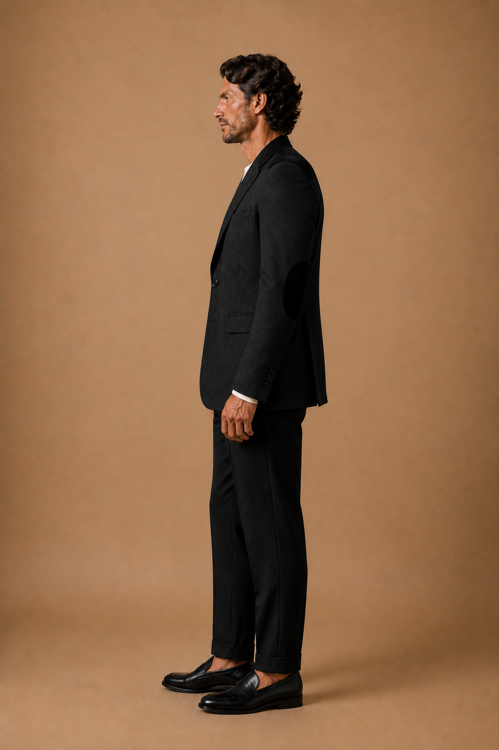 Black modern fit men's blazer by Vellor Vault, back view.