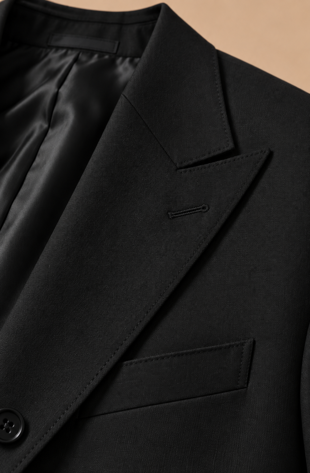 Black modern fit men's suit jacket by Vellor Vault, detail view.