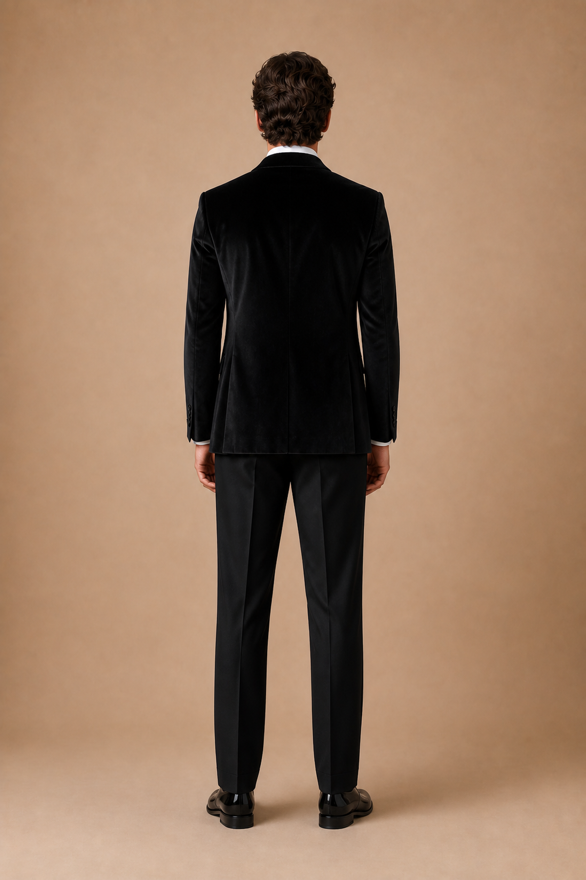 Black modern fit men's tux jacket by Vellor Vault, back view.
