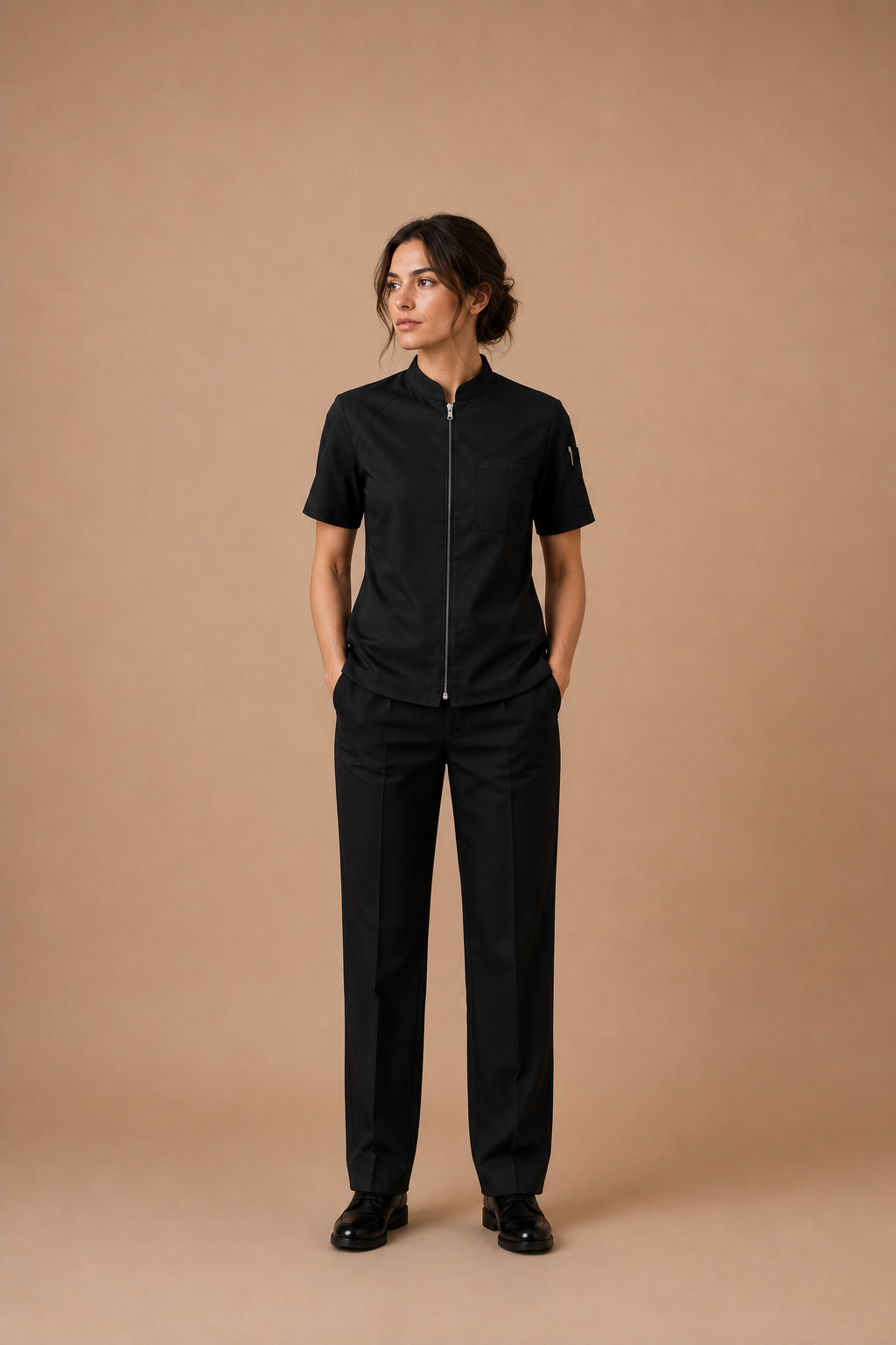 Black modern fit men's uniform by Vellor Vault, angle view.