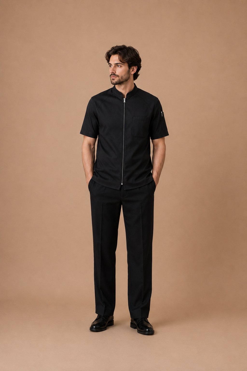Black modern fit men's uniform by Vellor Vault, front view.