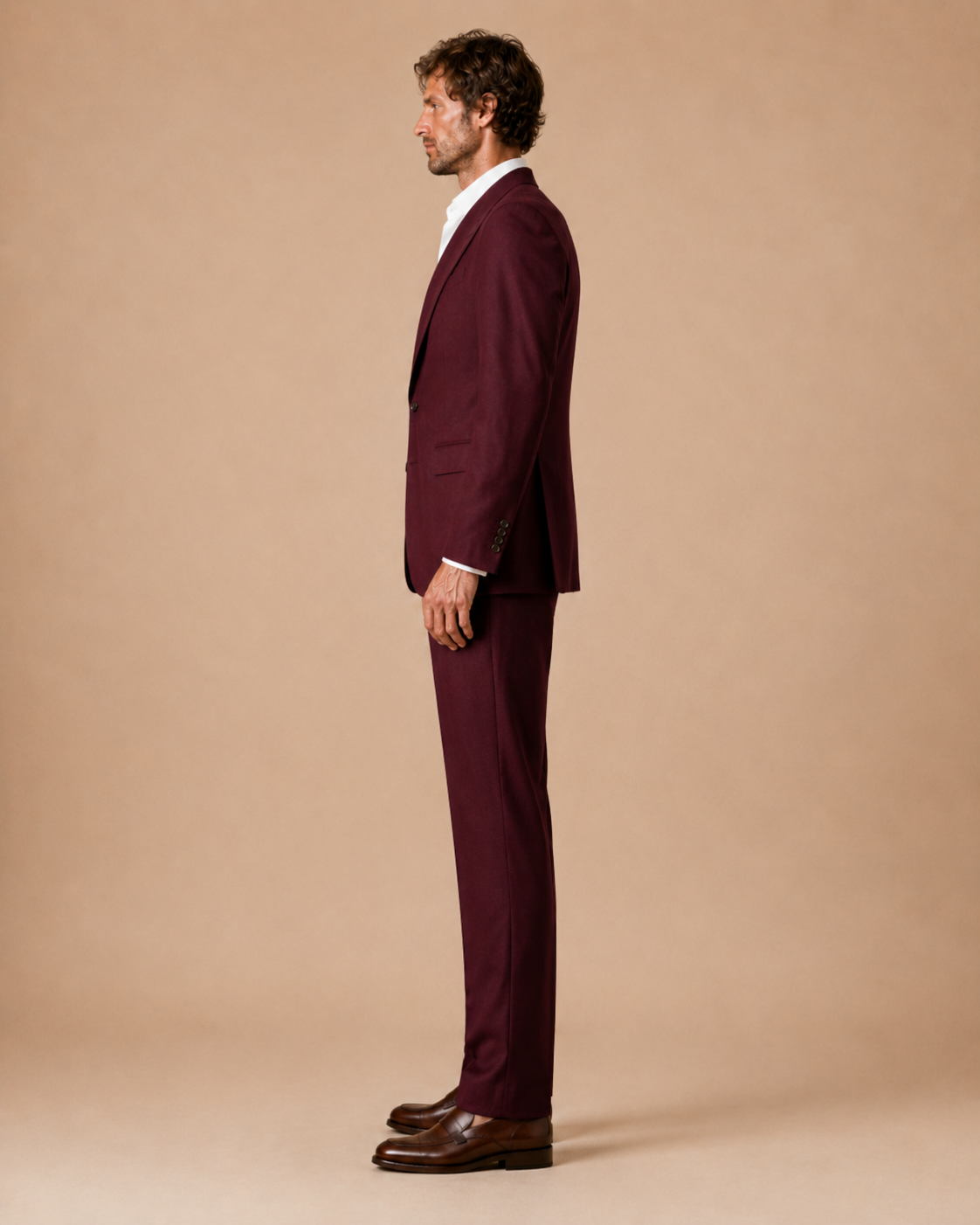 Burgundy modern fit men's suit jacket by Vellor Vault, back view.